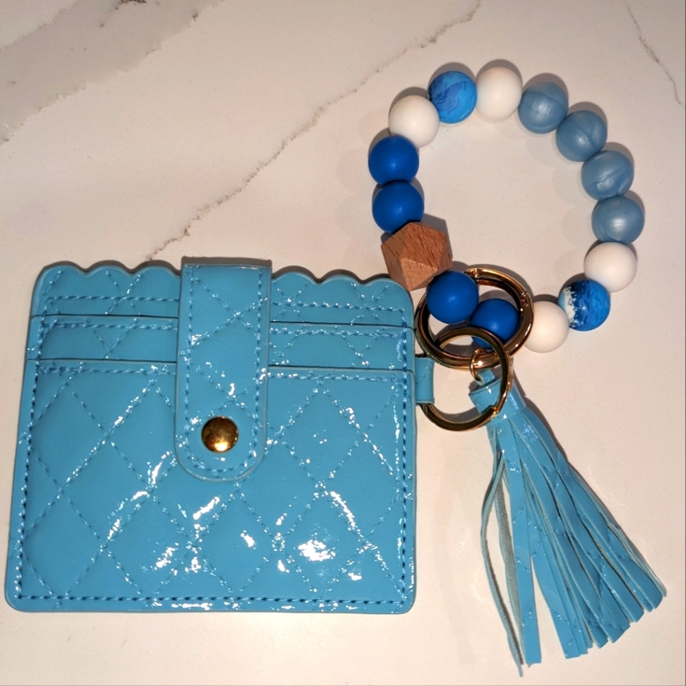 Ladies wristlet. Card holder. Brand new. Jumbo beans on elastic